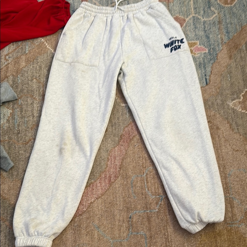 white fox grey and navy blue sweatpants